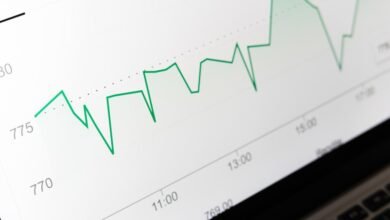 laptop with rising graph